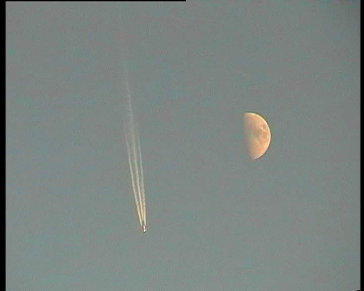 Vapour trails and the Moon